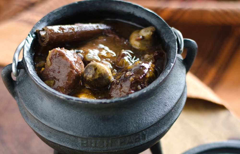 How to make venison potjie served with buttered samp and beans