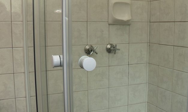 How to install a corner shower door
